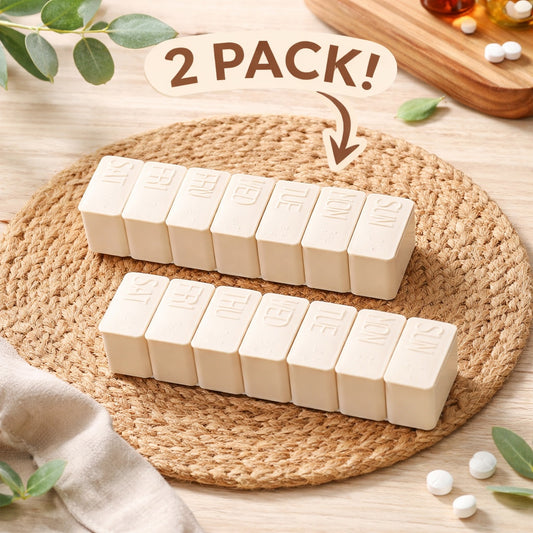 Two beige pill organizers with '2 Pack!' text on a woven mat.