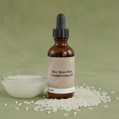 Bottle of rice bran hair conditioning oil with a dropper on a green background